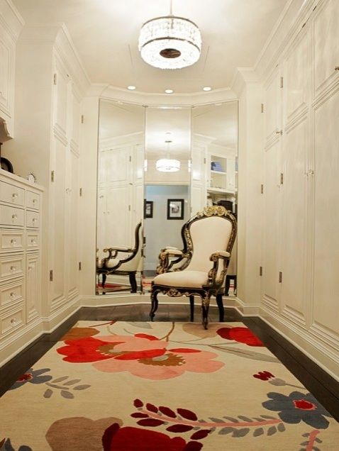 a fancy chair in a custom closet