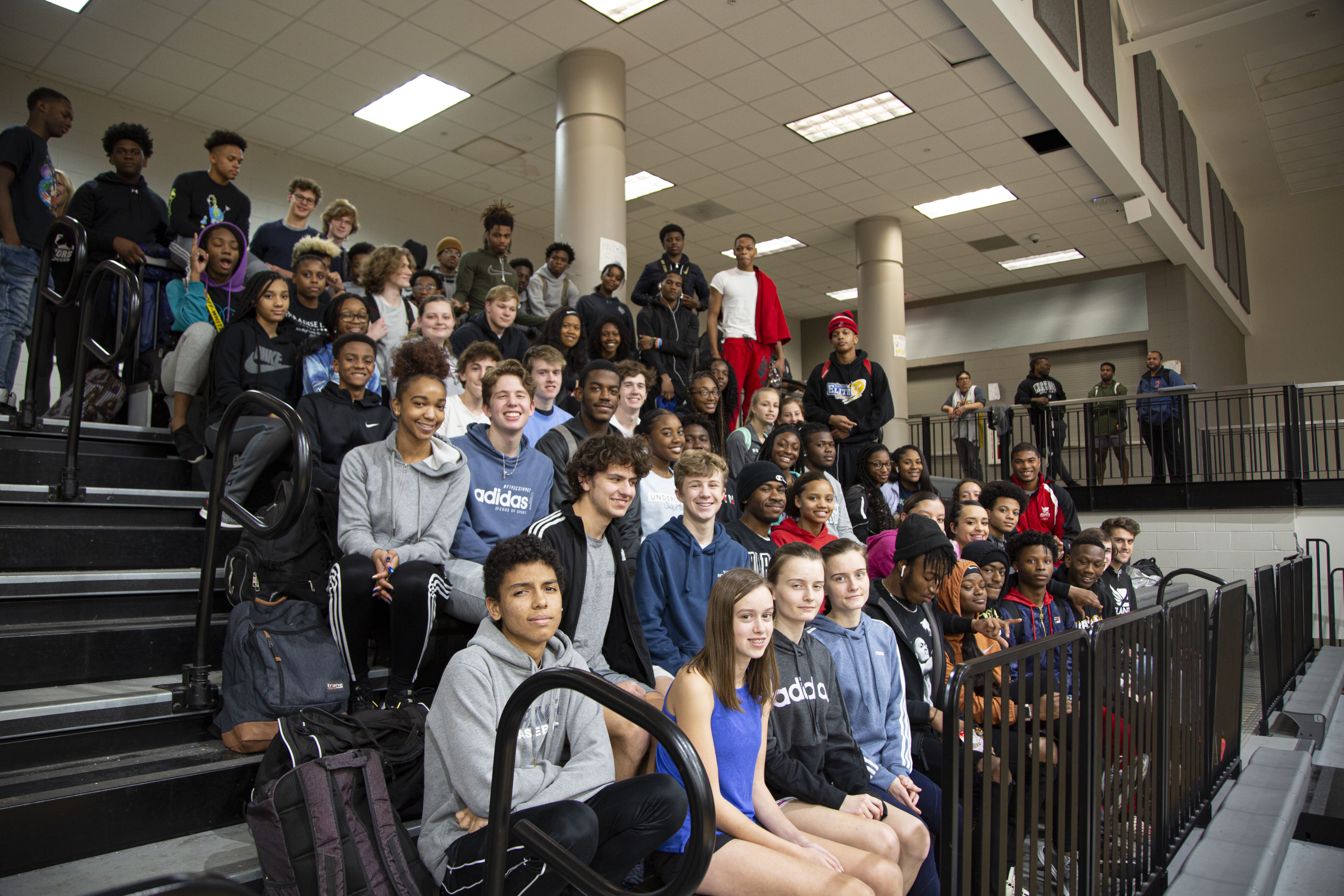 Atlanta Track Club Elite Yolanda Ngarambe and Avery Bartlett visit 50 athletes at North Atlanta High School Track & Field practice.