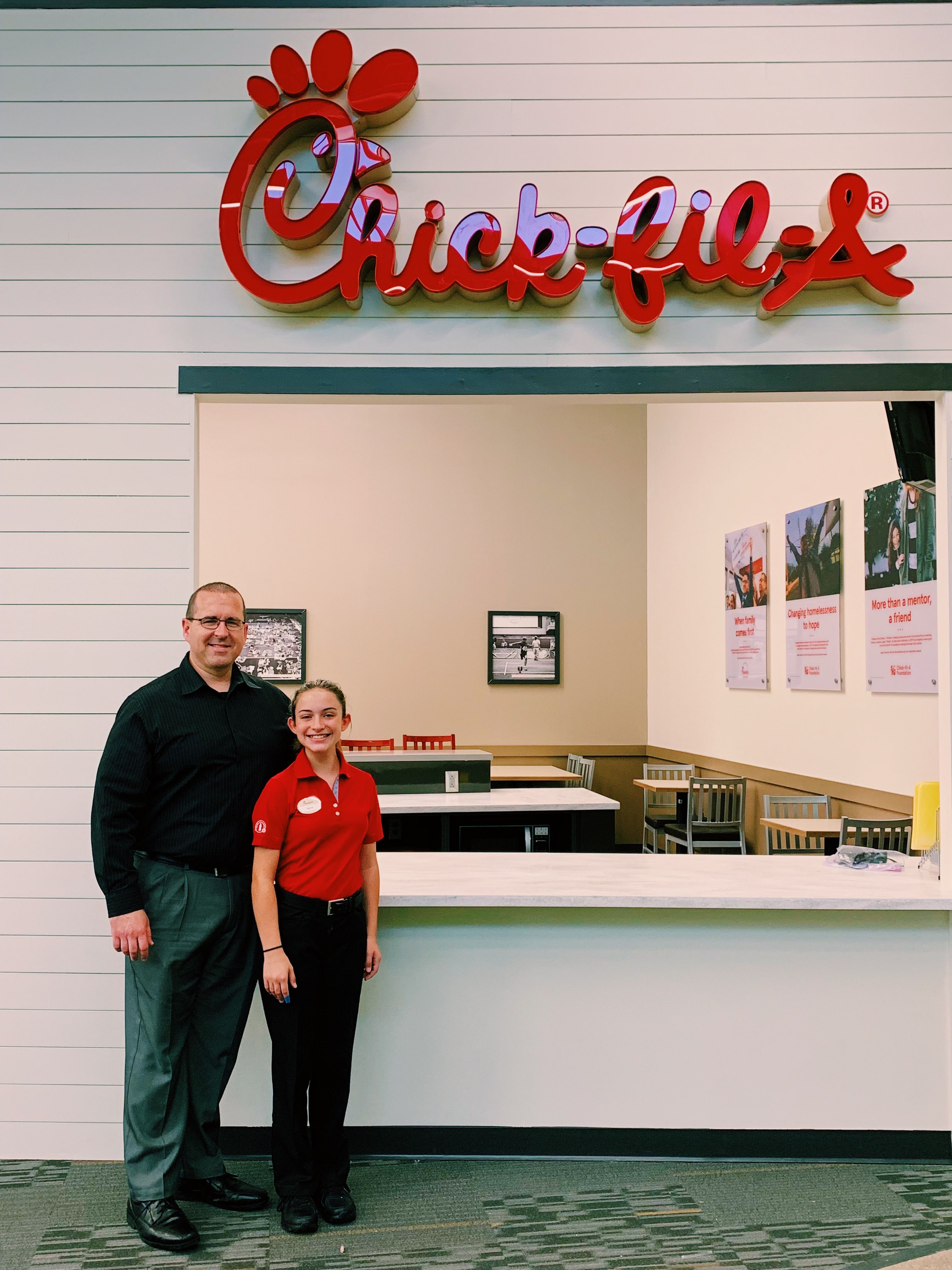 Tony and Sierra at the JA Finance Park Chick-fil-A storefront in Fort Wayne, Indiana