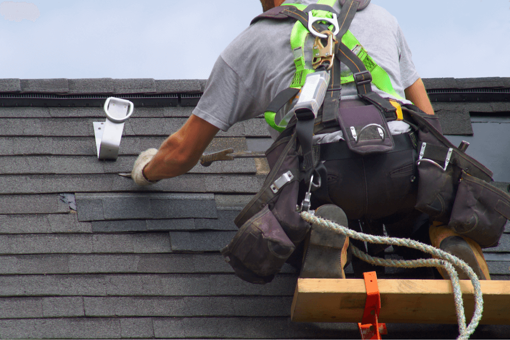 Man Fixing Roof