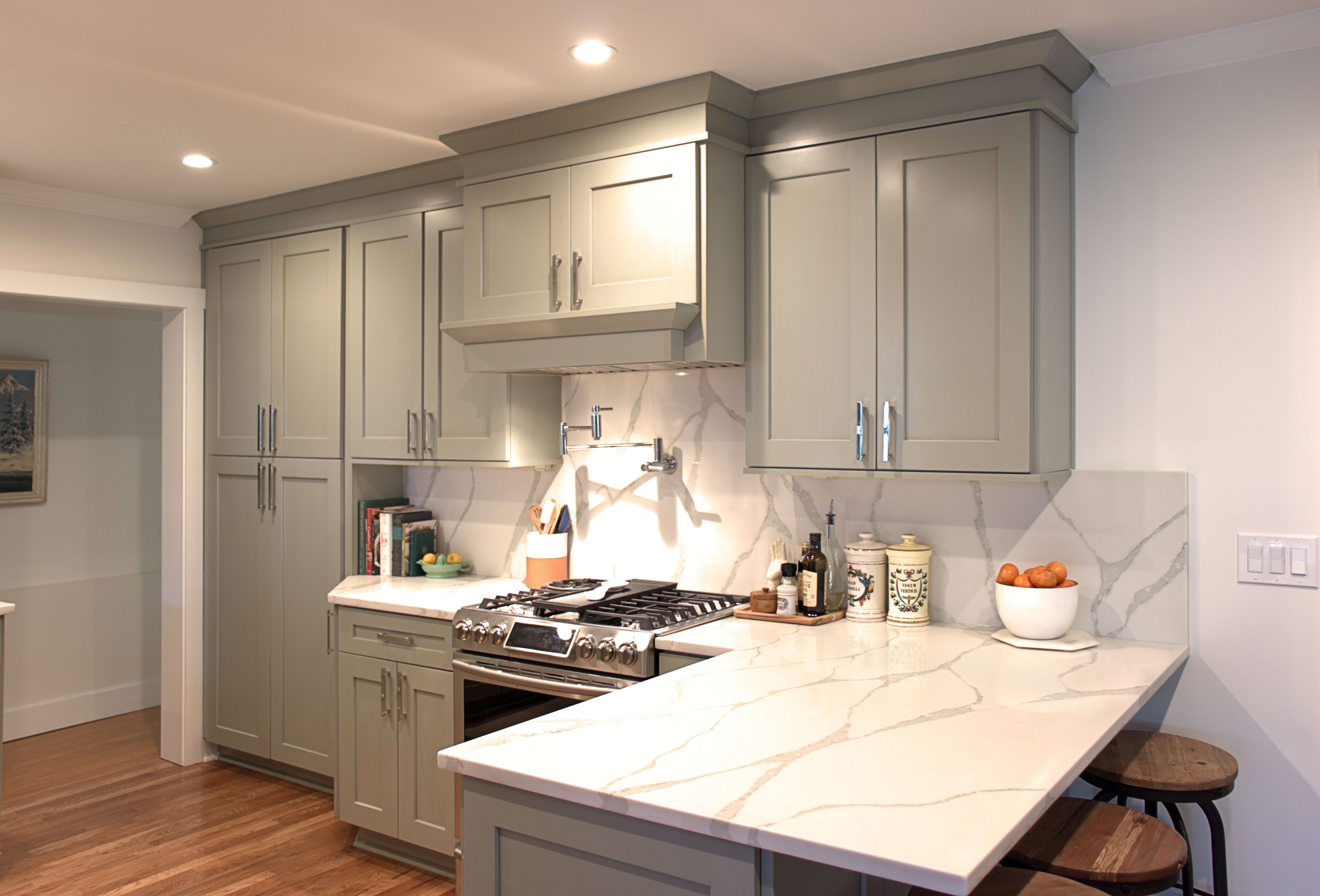 Kitchen cabinets with different colored crown molding