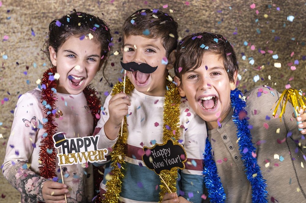 Kids celebrating New Year's Eve