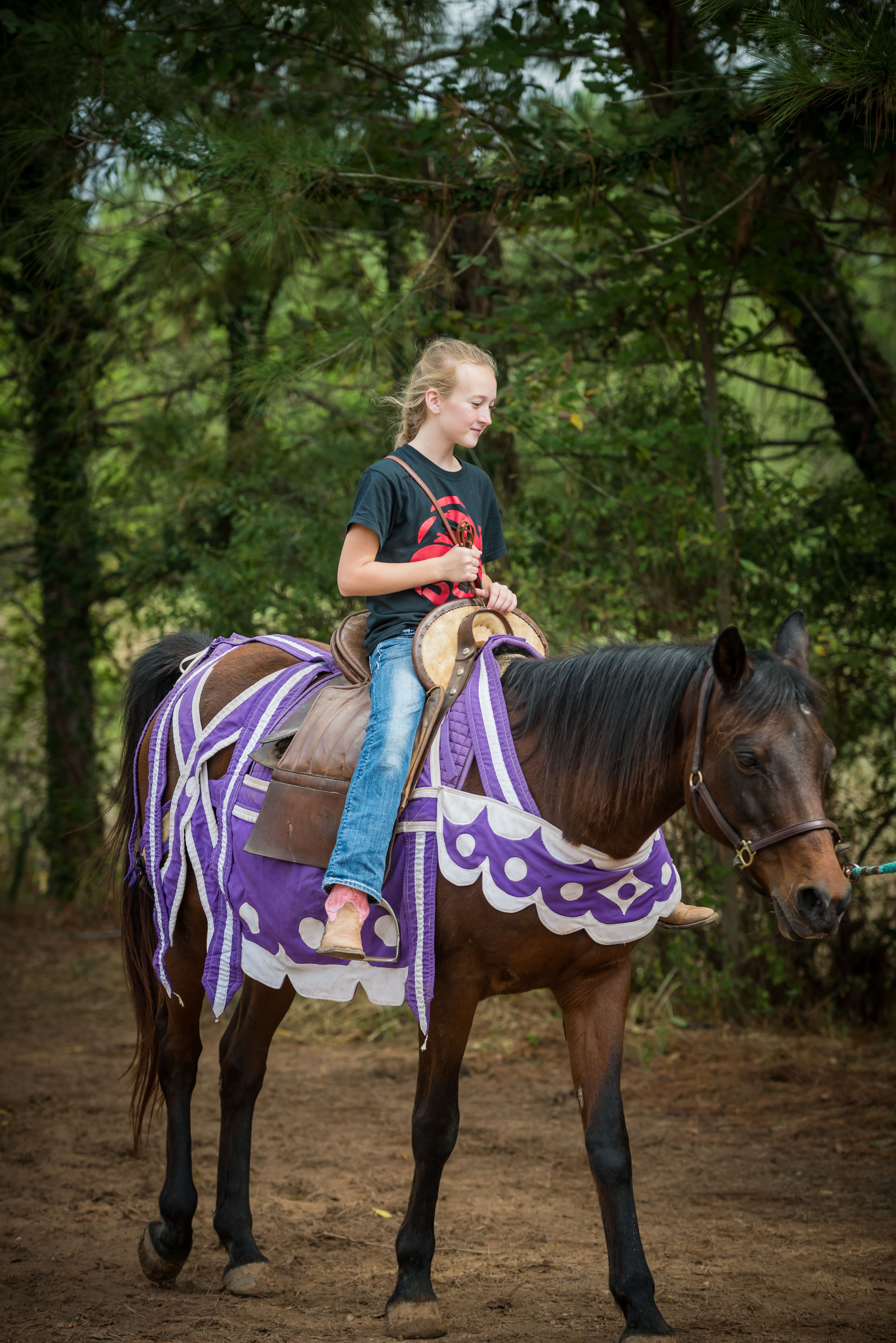 A student has an opportunity to ride near the Joust Arena.