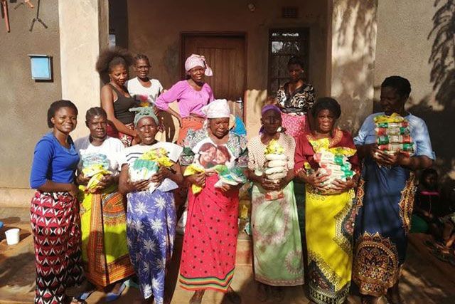 Women from Hope for Widows in Malawi Africa take a group photo