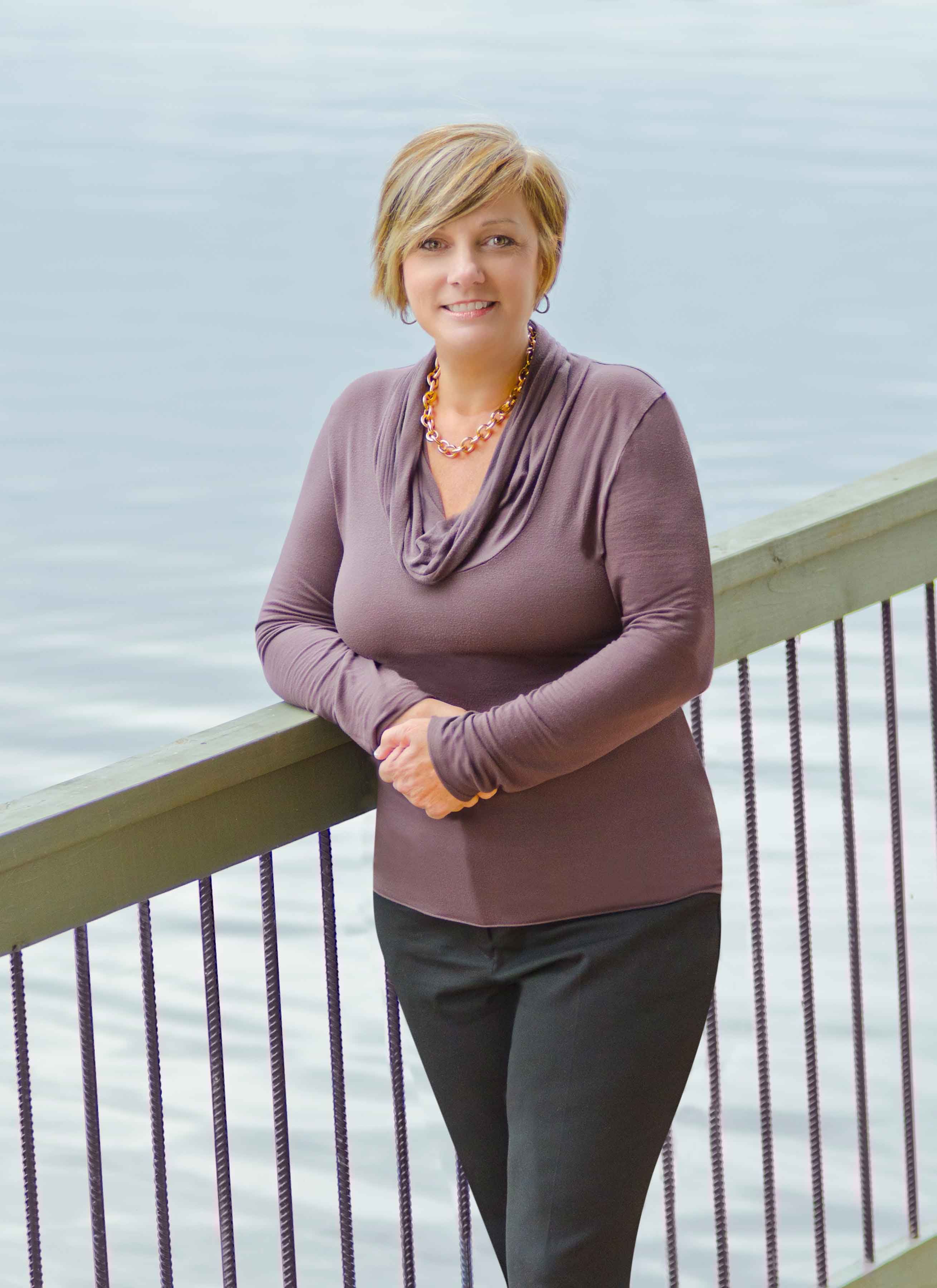 Berry alumna standing by ocean