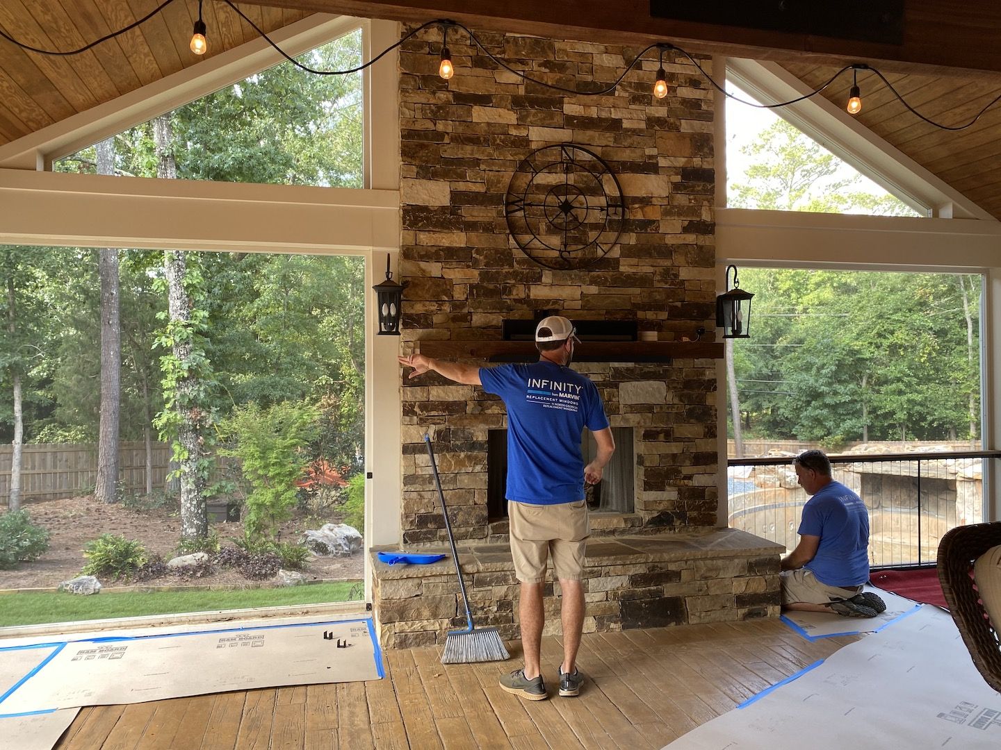 The process of converting a screened-in porch to a four seasons sunroom.