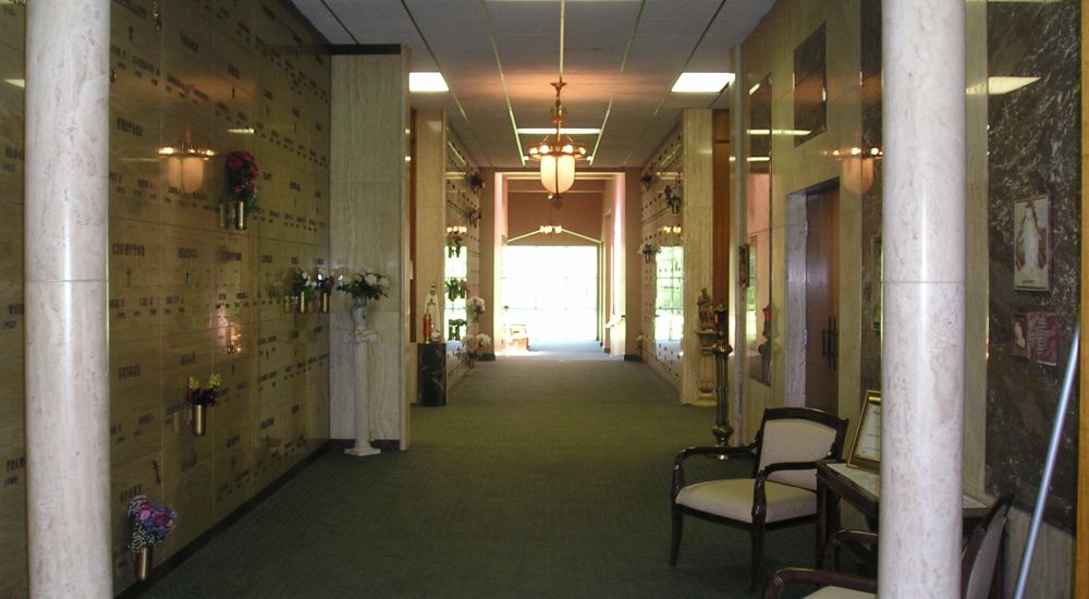 a hallway with chairs and tables