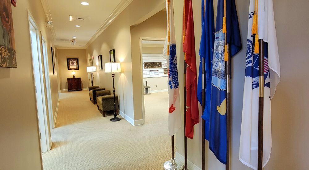 a hallway with flags