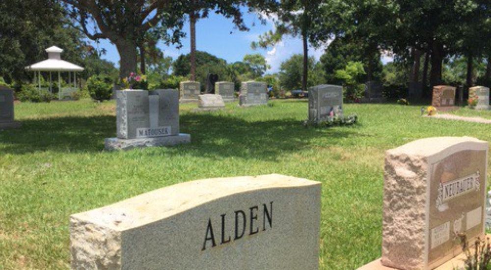 a gravestone in a cemetery