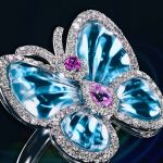 Pager to activate Blue Topaz Papillon Ring