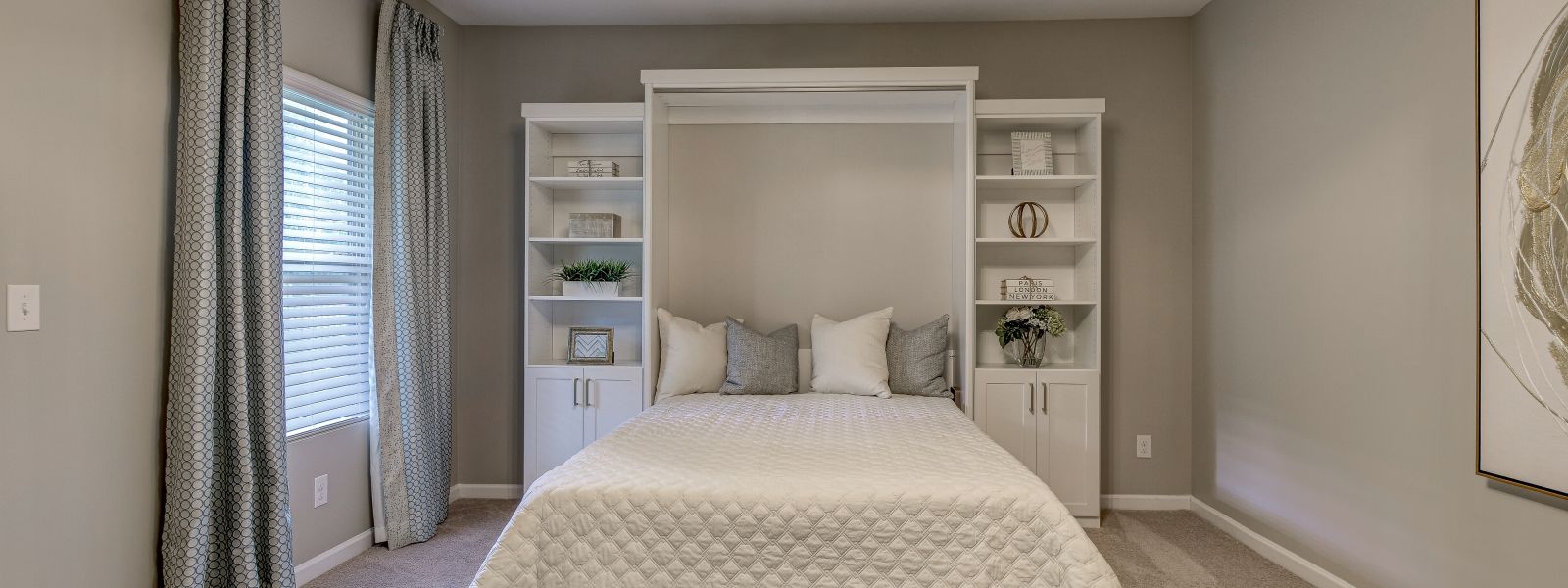 white cabinet wall bed pull down and with white comforter and grey and white pillows