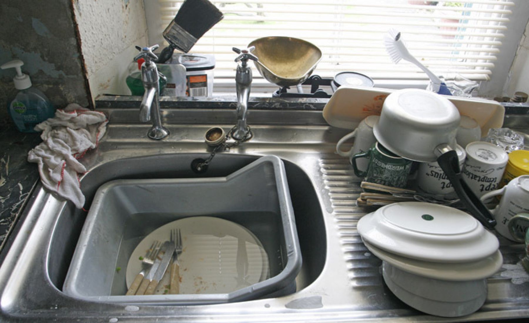kitchen sink backed up both sides