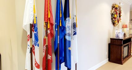 a group of flags from a wall