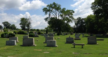 a cemetery with many tombstones