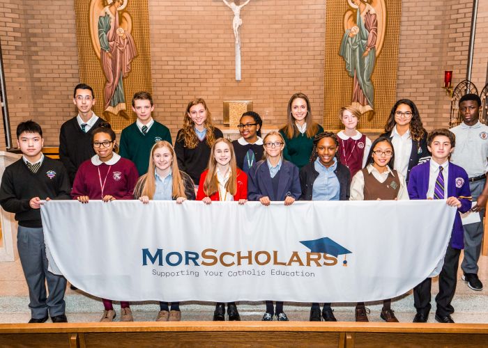 3rd Annual MorScholars Award recipients holding a MorScholars banner