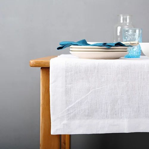 Leave cleaning your tablecloths and cloth napkins to us
